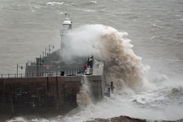 Red weather warnings have been issued for Northern Ireland and Scotland (Gareth Fuller/PA)