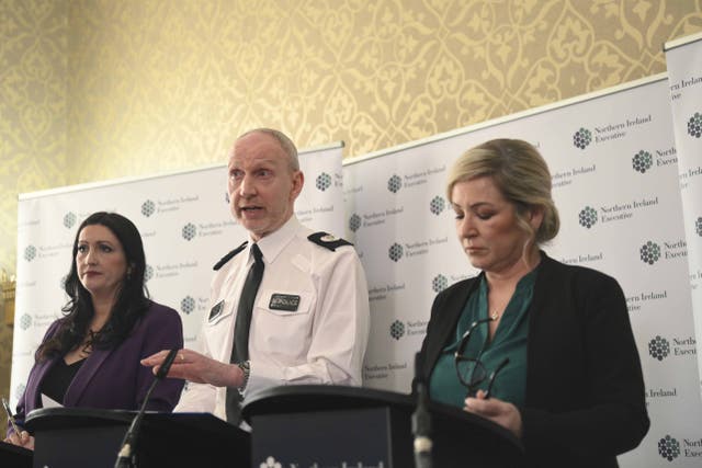 Deputy First Minister for Northern Ireland Emma Little-Pengelly with PSNI ACC Davy Beck and First Minister for Northern Ireland Michelle O’Neill speak to the media at Stormont buildings (Mark Marlow/PA)