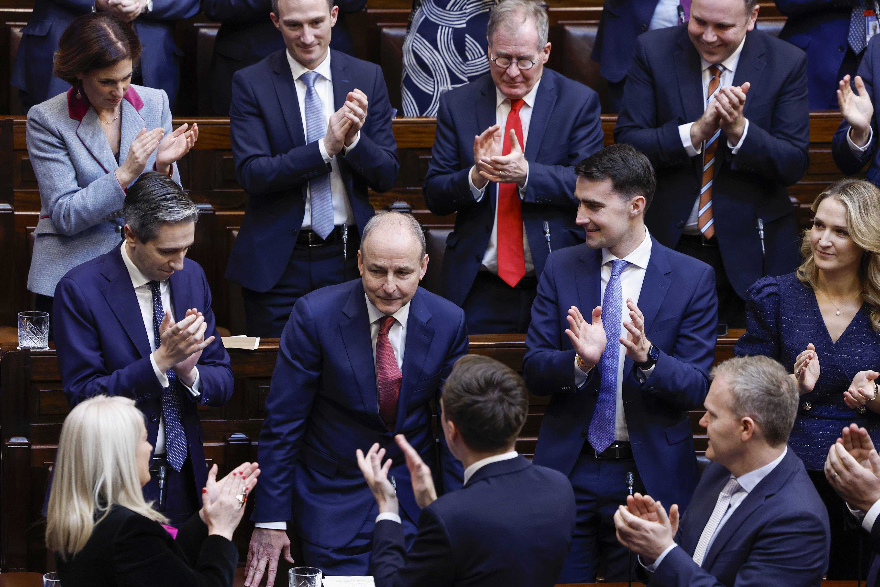 Micheal Martin receives a standing ovation from party and government colleagues in the 34th Dail in Dublin after his election (Maxwell’s/PA)