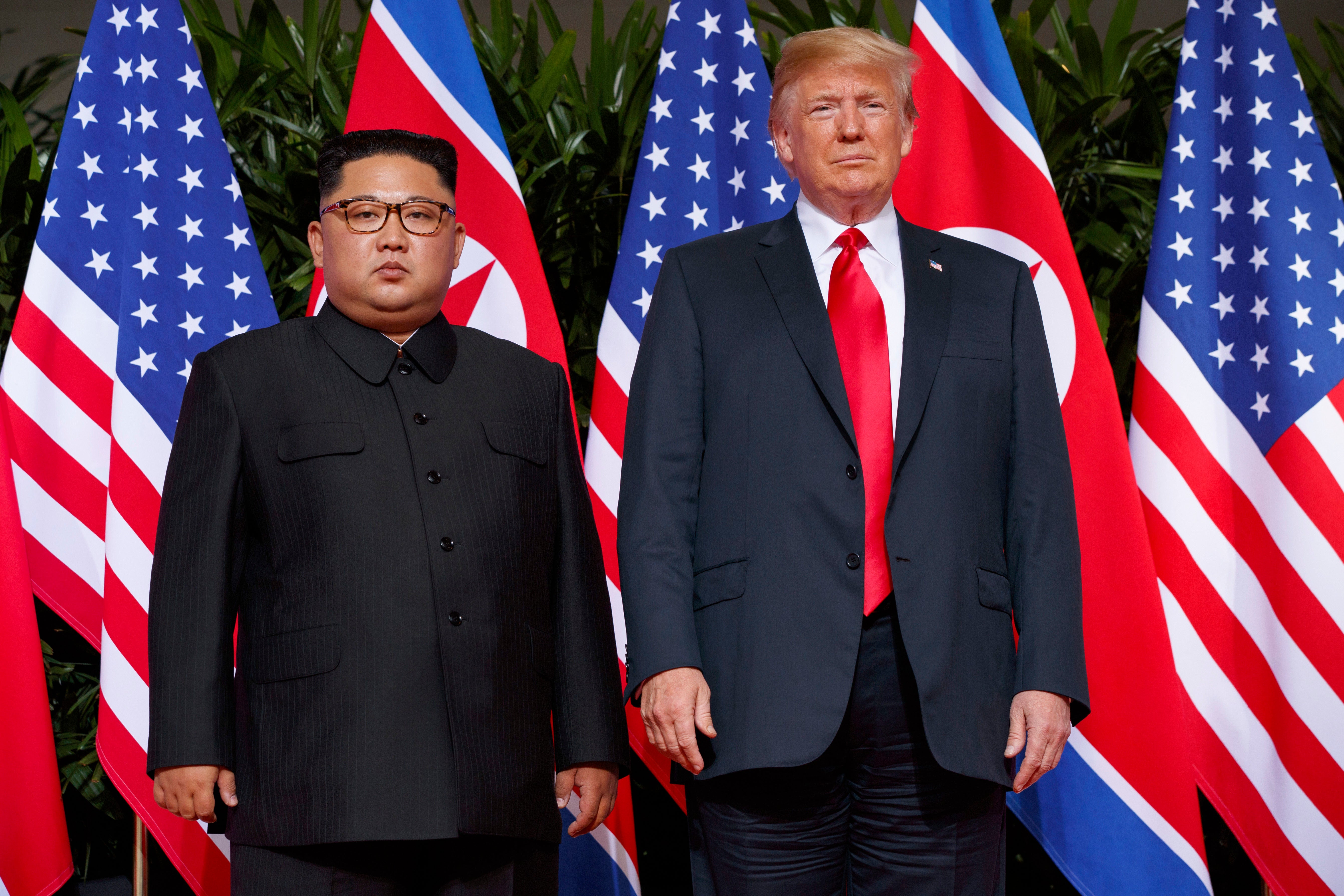 File: Us president Donald Trump, right, meets with North Korean leader Kim Jong Un on Sentosa Island, in Singapore, June 12, 2018 (AP)