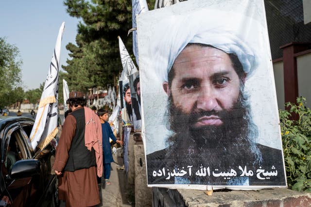 <p>A poster of Taliban Supreme Leader Hibatullah Akhundzada is seen along a road in Kabul </p>