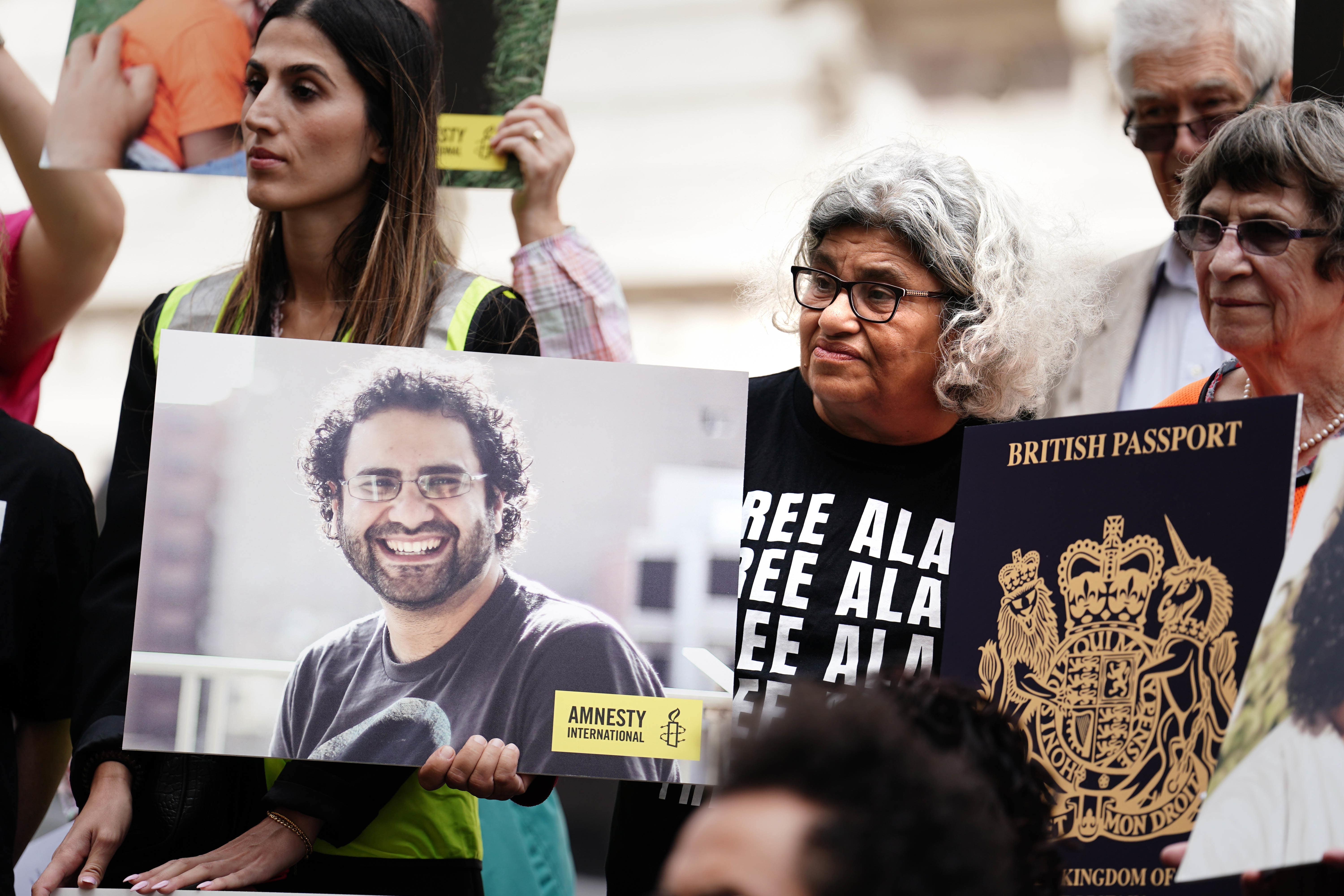 Laila Soueif (centre right), the mother of Alaa Abd el-Fattah, taking part in a vigil for the jailed pro-democracy activist in July 2023 (Jordan Pettitt/PA)