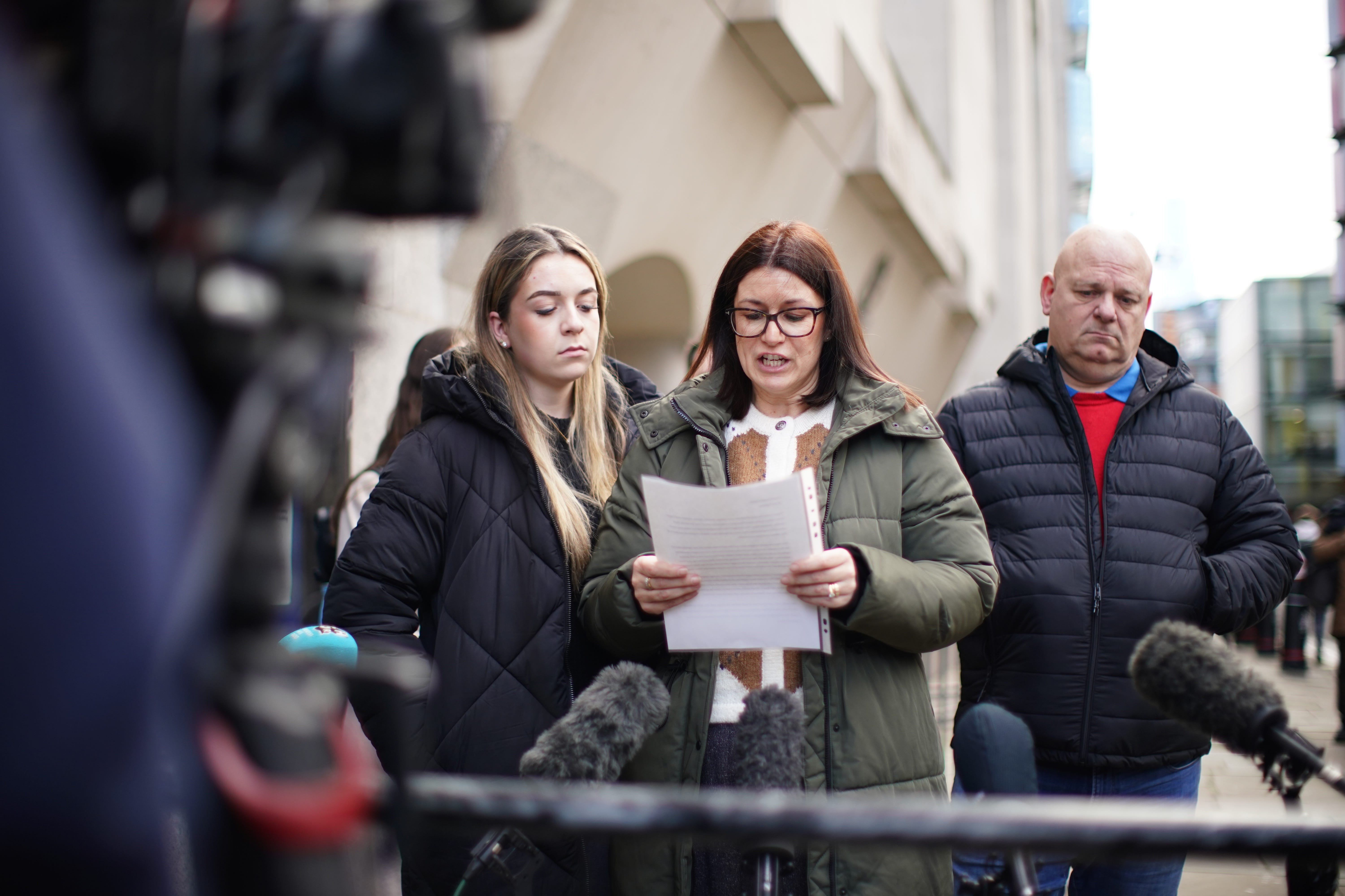 From left, Casey Hoath, Kerrie Hoath and Jason Hoath speaking outside the Old Bailey, London (James Manning/PA)