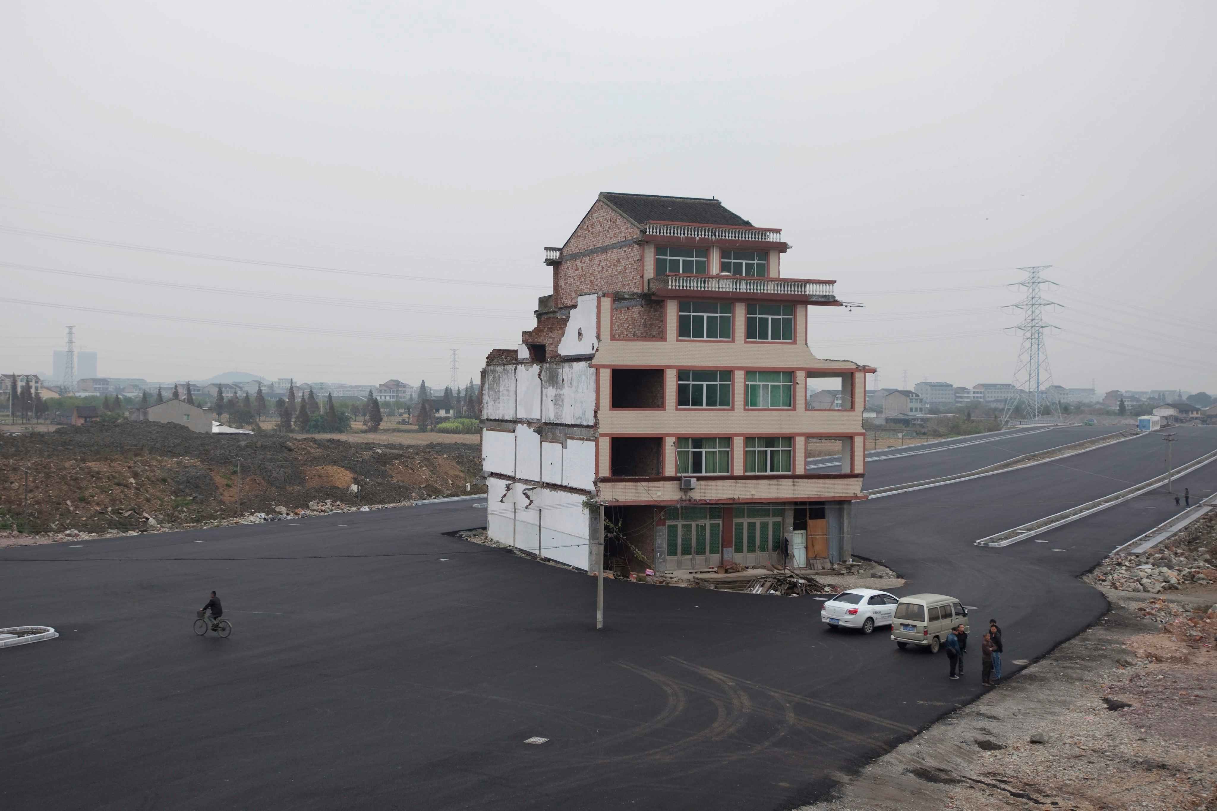 A five-floor ‘nail house’ successful  China’s Zhejiang province. It was demolished successful  2012 aft  the proprietor  yet   accepted compensation to move