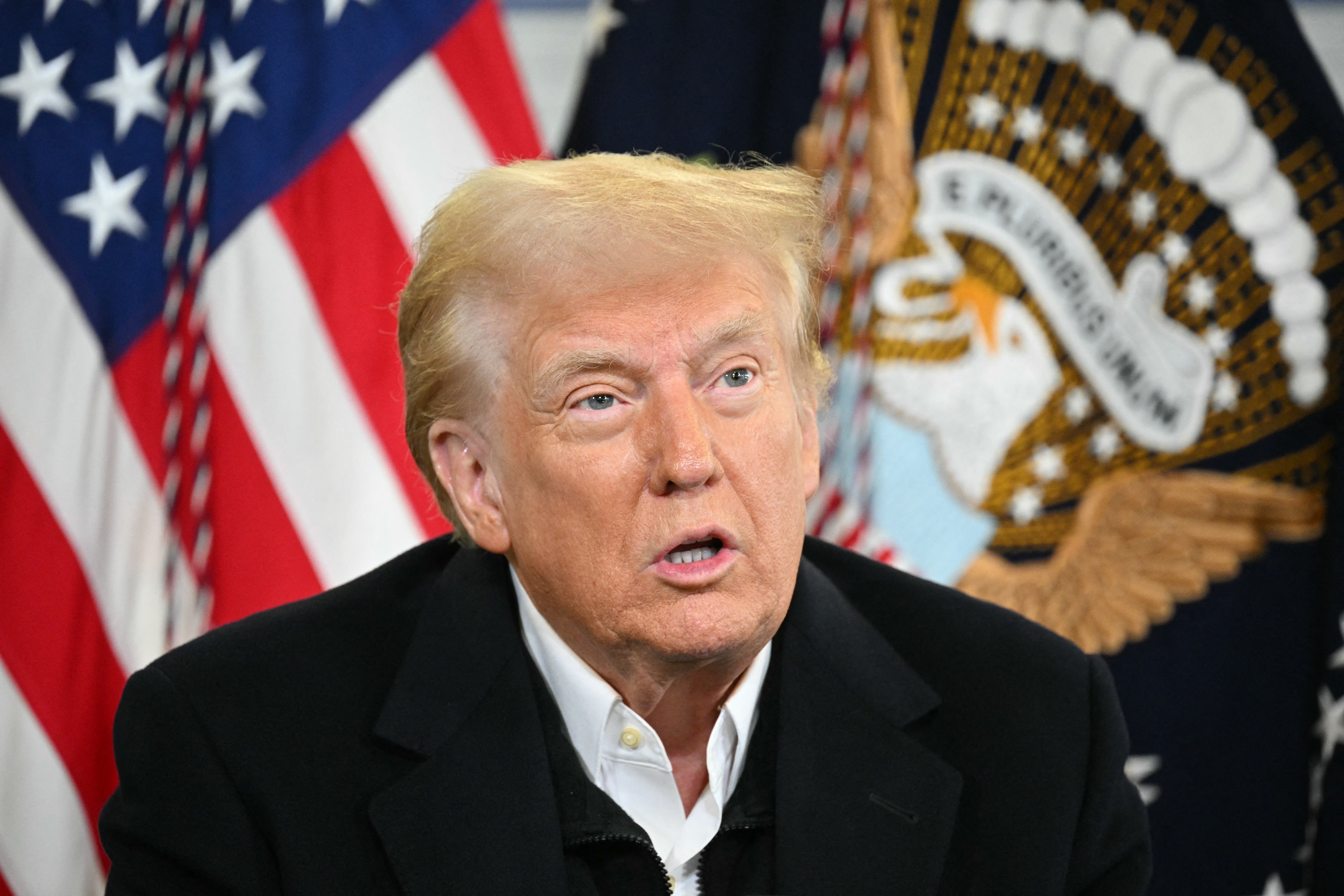 President Donald Trump speaks at a Hurricane Helene recovery briefing in Fletcher, North Carolina, on Friday. Trump talked about FEMA, California, and more