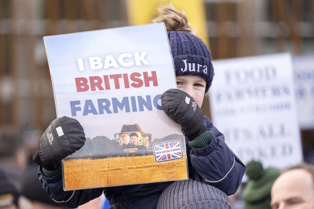 Members of the National Farmers’ Union (NFU) Scotland take part in a rally outside Scottish Parliament in Edinburgh to call on the Scottish Budget to deliver increased and ringfenced funding for farmers and crofters (Jane Barlow/PA)