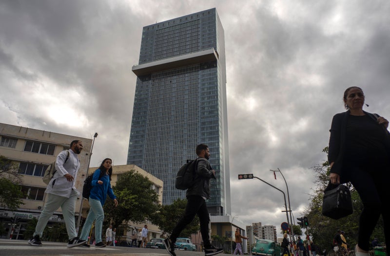 A new luxury hotel towers over Havana as Cuba's economic troubles mount and tourism plummets