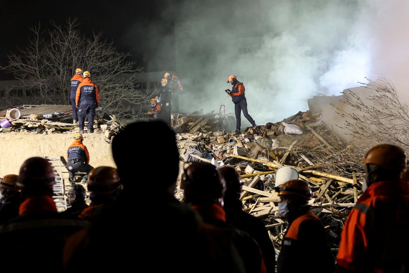 Apartment building collapses in central Turkey, trapping 2 people