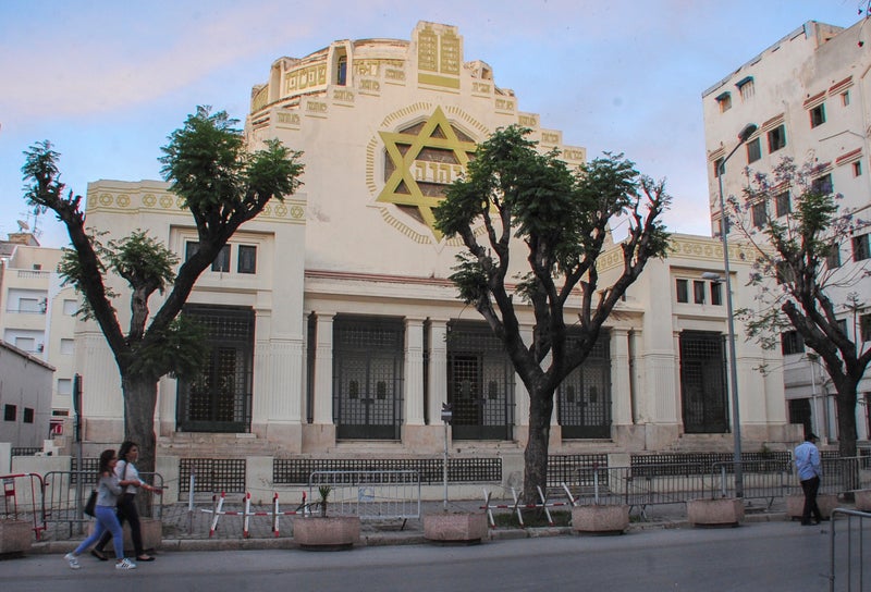 Police kill a man who set himself on fire outside a Tunisian synagogue