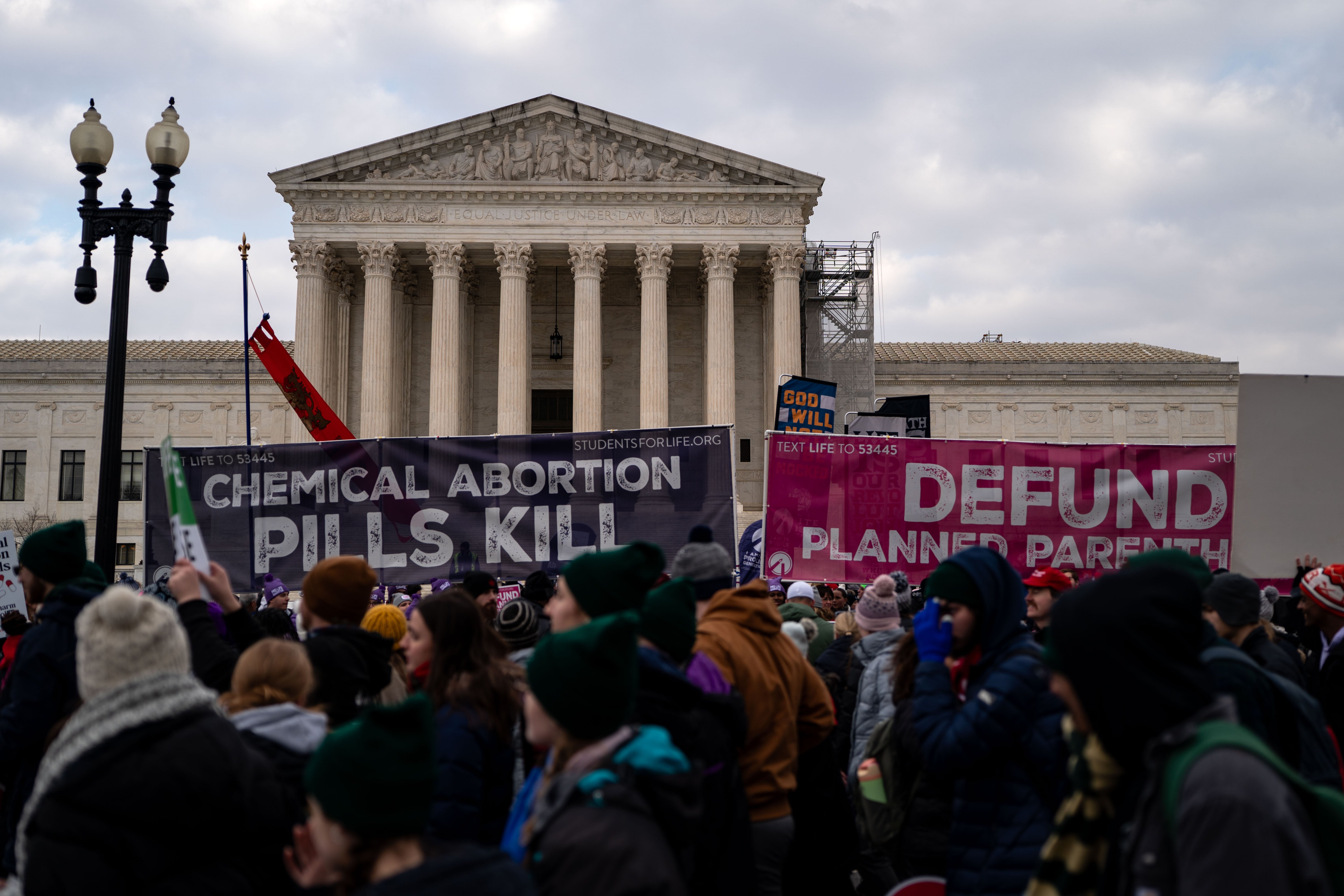 People attend the annual March for Life rally near the Supreme Court. Hours after the rally, Trump revived a pair of anti-abortion policies from his first term