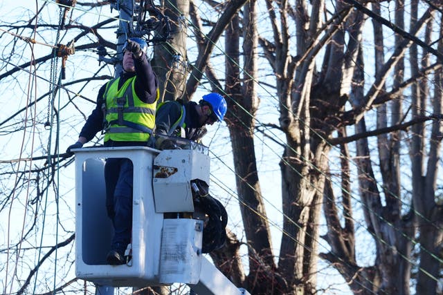ESB Networks crew working to restore power in Avoca Avenue in Blackrock, co dublin, after Storm Eowyn left one person dead, more than a million people without power and caused significant travel disruption across the UK and Ireland (Brian Lawless/PA)