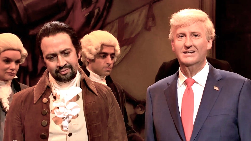 James Austin Johnson’s Donald Trump (right) shuts up Lin-Manuel Miranda as he’s rappong about signing the Declaration of Independence in Saturday Night Live’s cold open