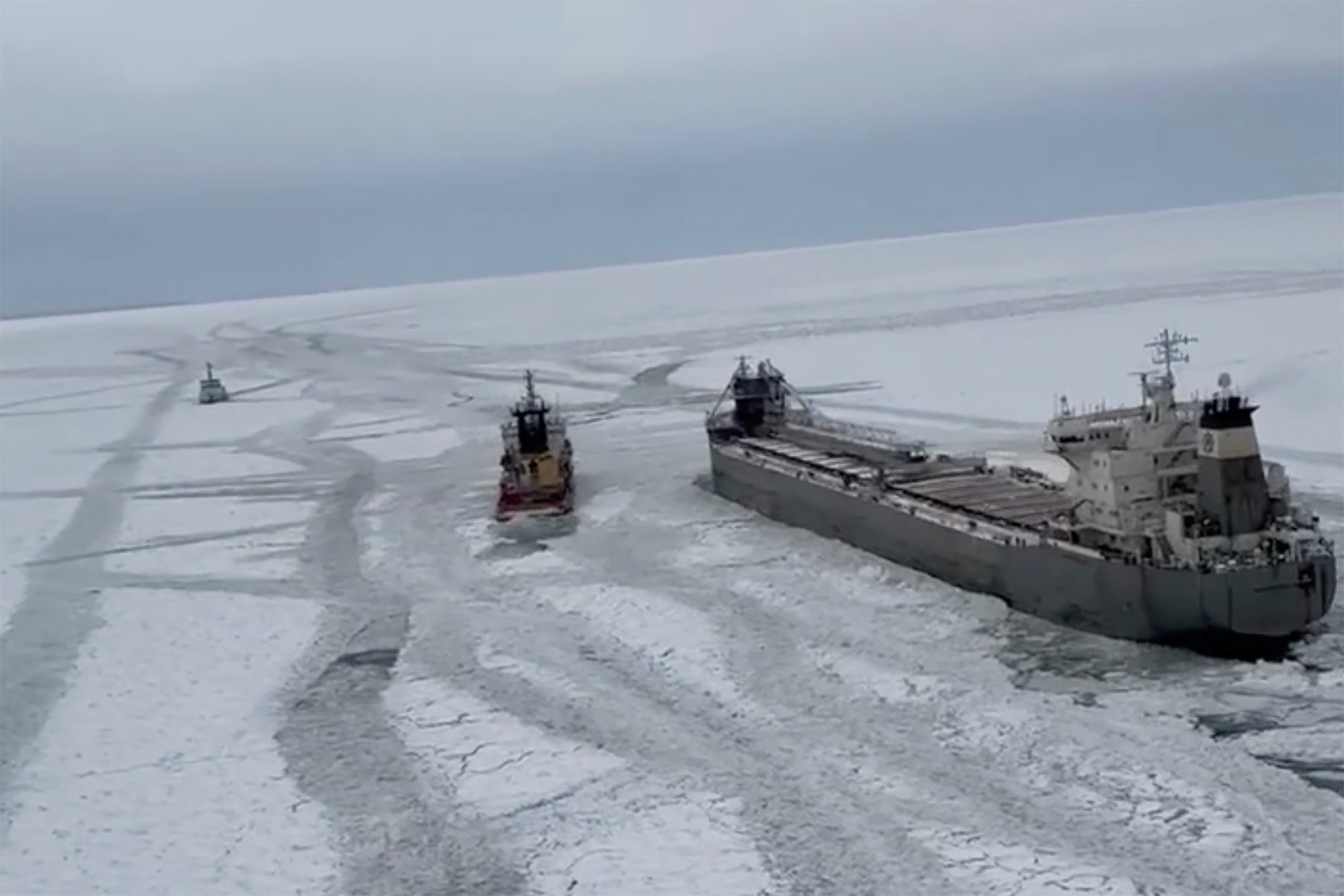 A frozen freighter is on the move after getting stuck for days in ice on Lake Erie