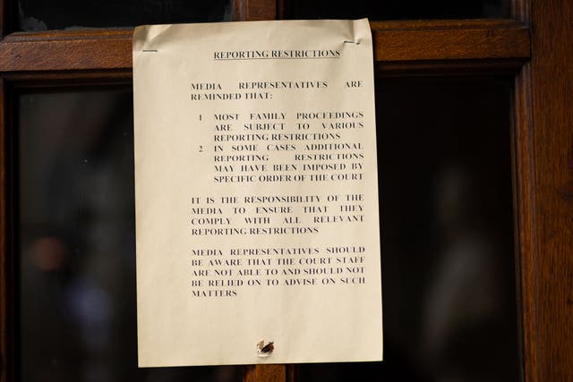 A reporting restrictions sign outside one of the Family Court courtrooms at the Royal Courts of Justice (Aaron Chown/PA)