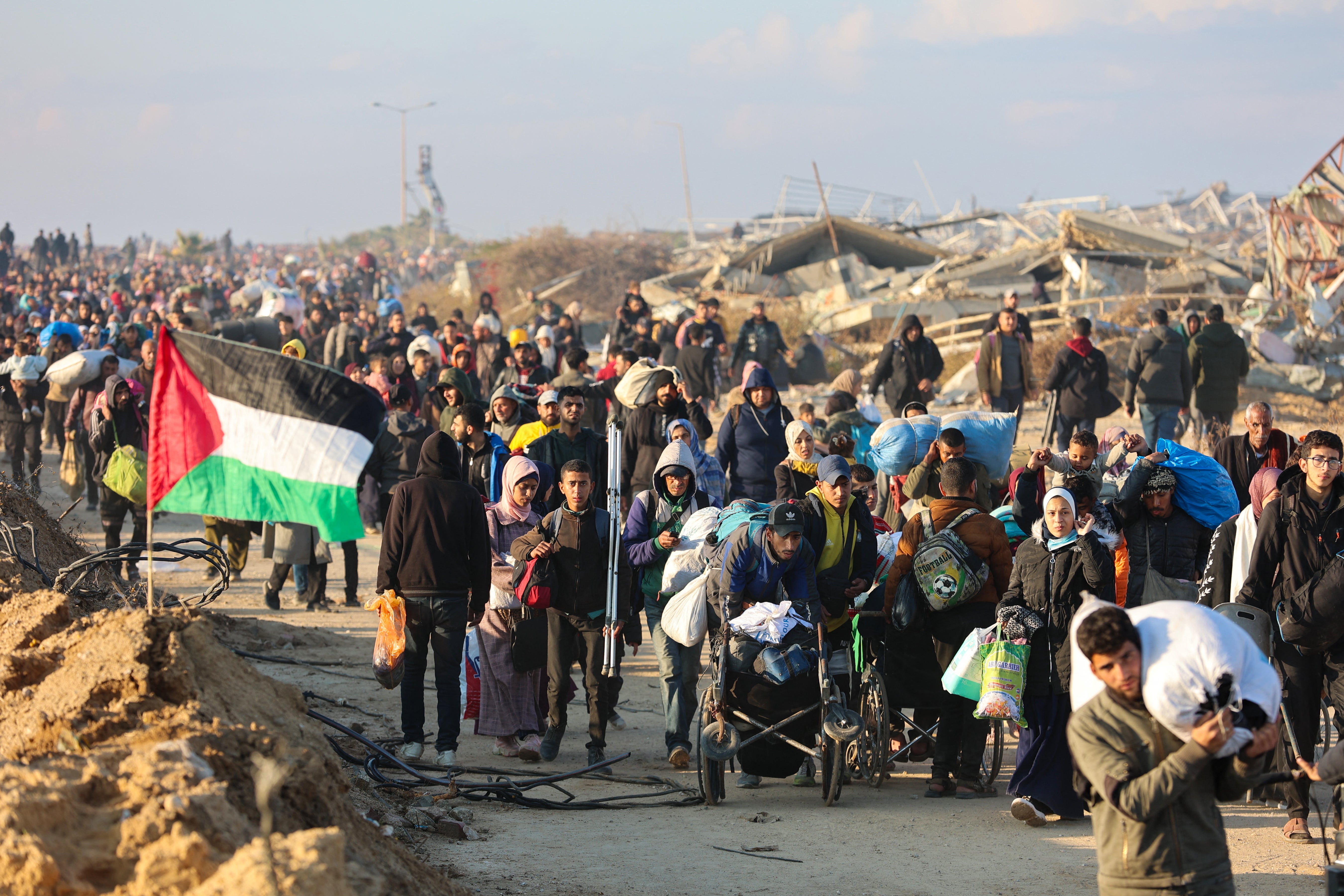 Civilians were seen heading for their homes in northern Gaza on Monday morning