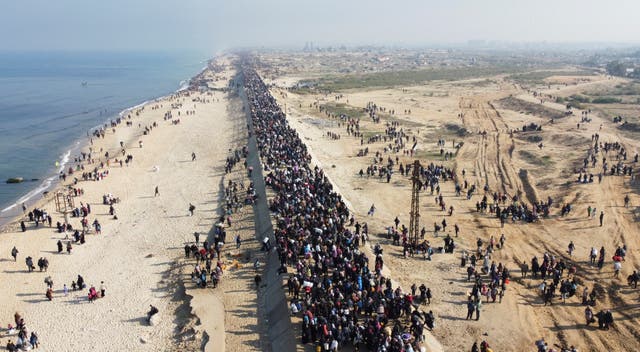 <p>A drone view shows Palestinians, who were displaced to the south at Israel’s order during the war, making their way back to their homes in northern Gaza</p>