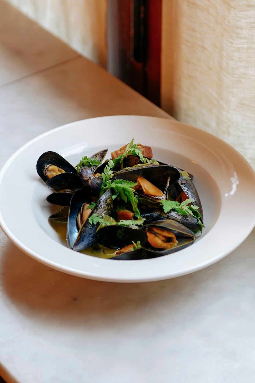 Marseille in a bowl, with smoky bacon and an anise-scented broth begging for bread