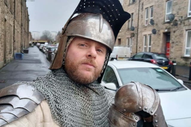 Callum Maclean said he wanted to make people laugh by going out in the storm dressed as a knight (Callum Maclean/PA)