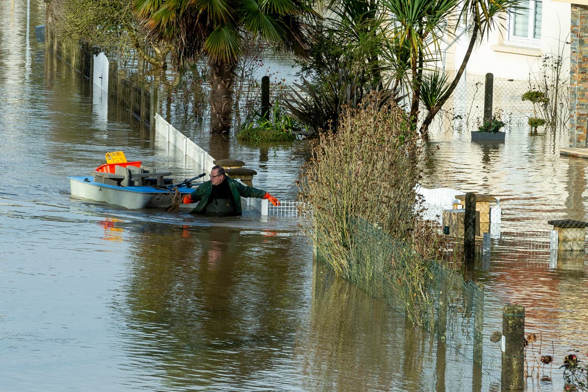 French residents rescued from flooded homes by boat as Storm Herminia hits Normandy and Brittany