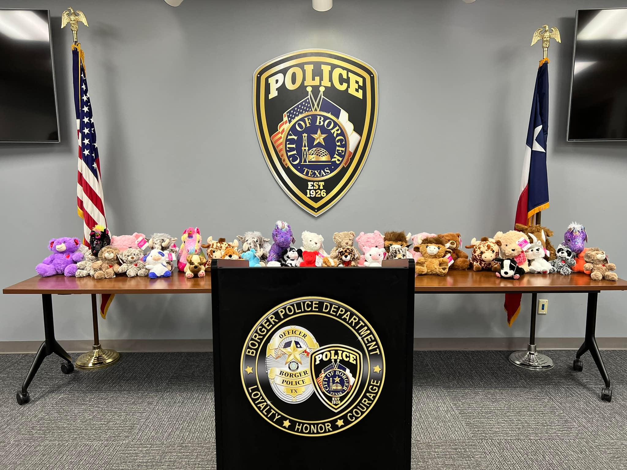 Police shared that Walmart donated 40 stuffed animals to be laid down at the memorial in front of the Gateway School