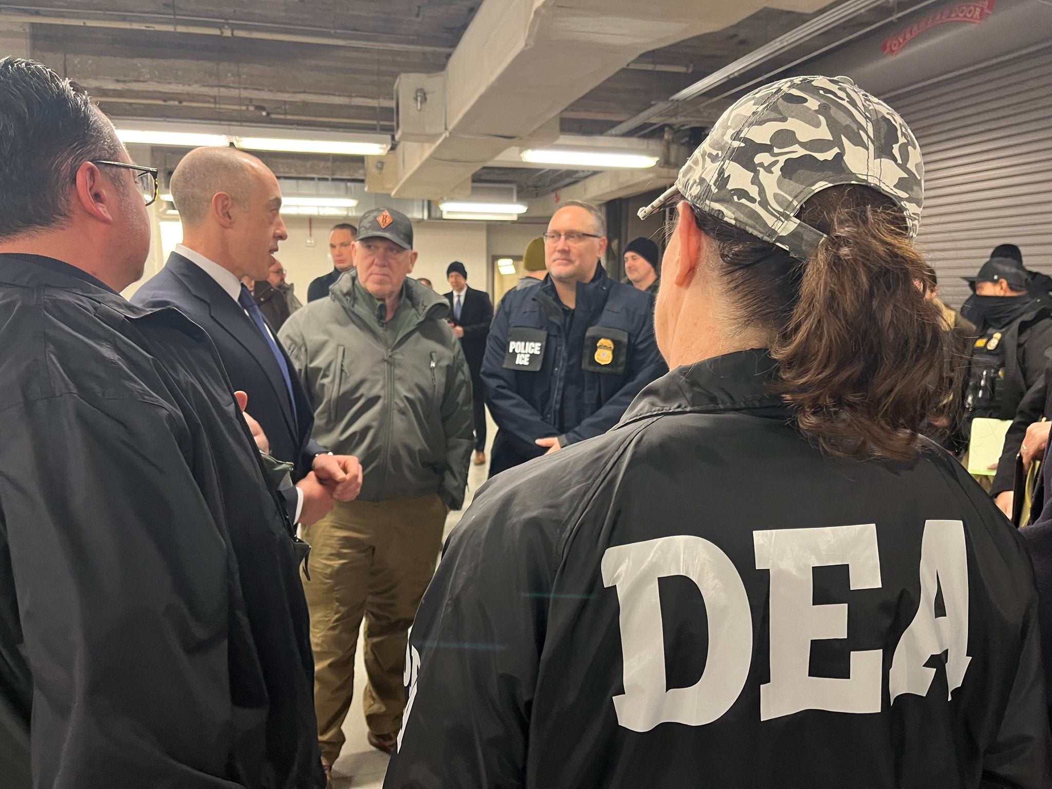 Acting Deputy U.S. Attorney General Emil Bove speaks with federal law enforcement agents and Donald Trump’s border czar Tom Homan during an immigration enforcement operation in Chicago on January 26