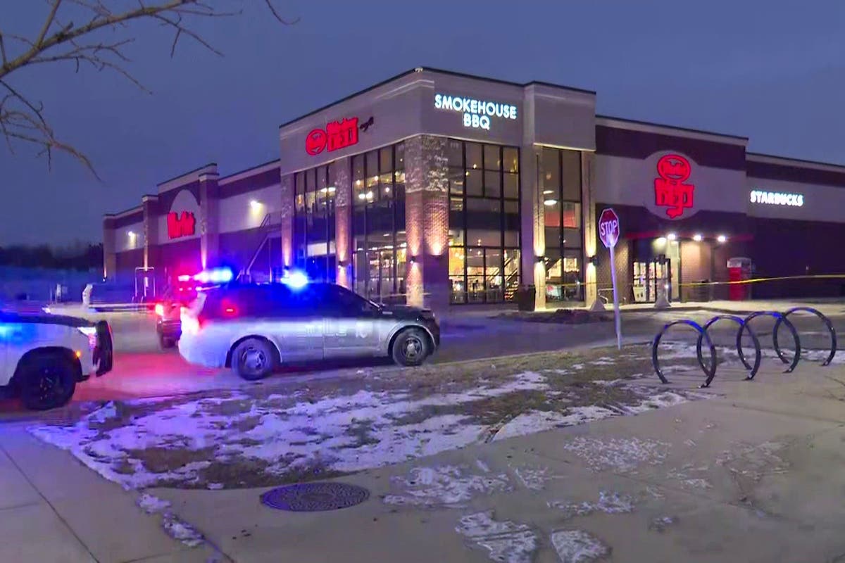 Shooting at Indiana store leaves 3 dead, including the suspect, and 2 officers wounded