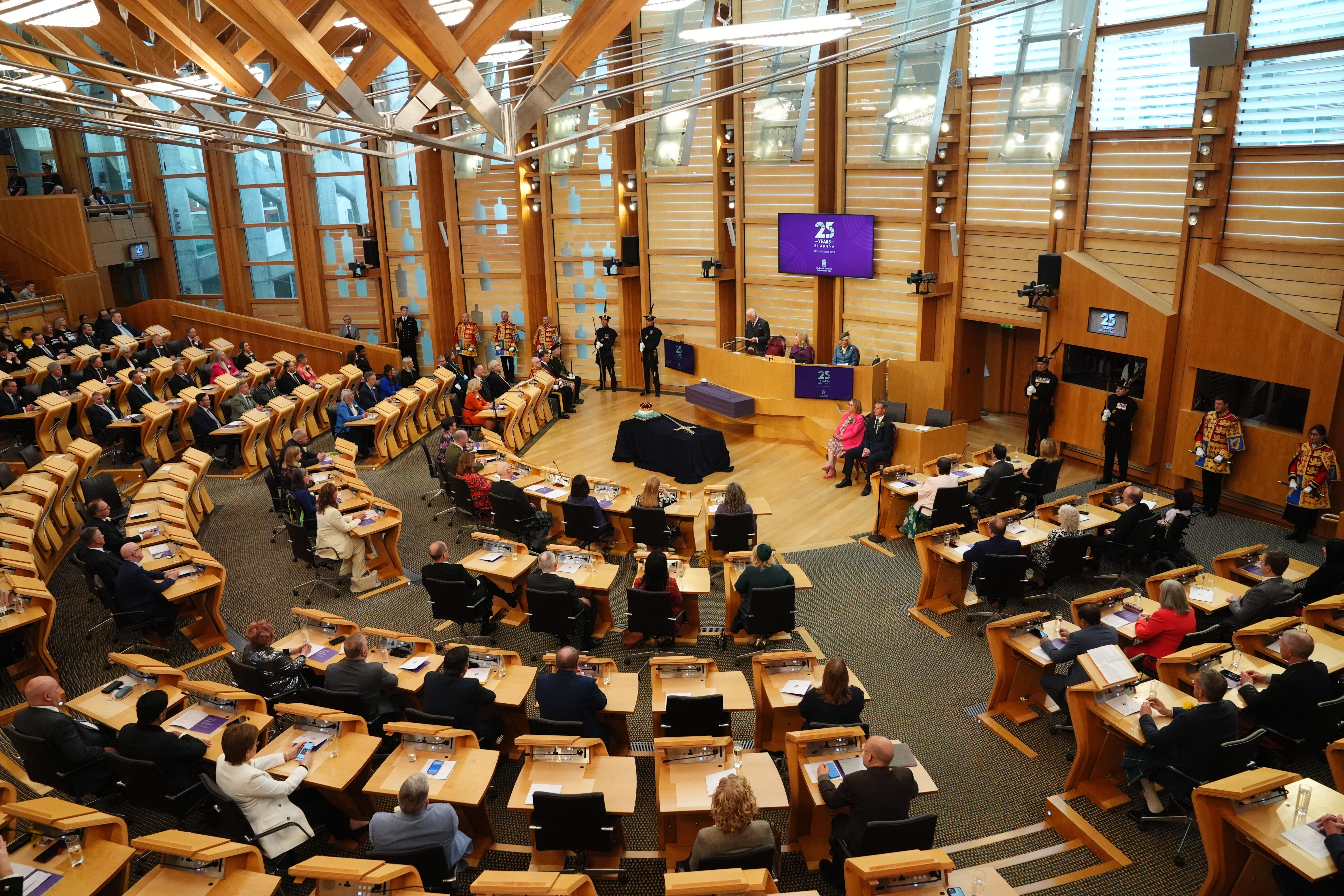The agreements mean the budget will pass in its final vote next month (Andrew Milligan/PA)