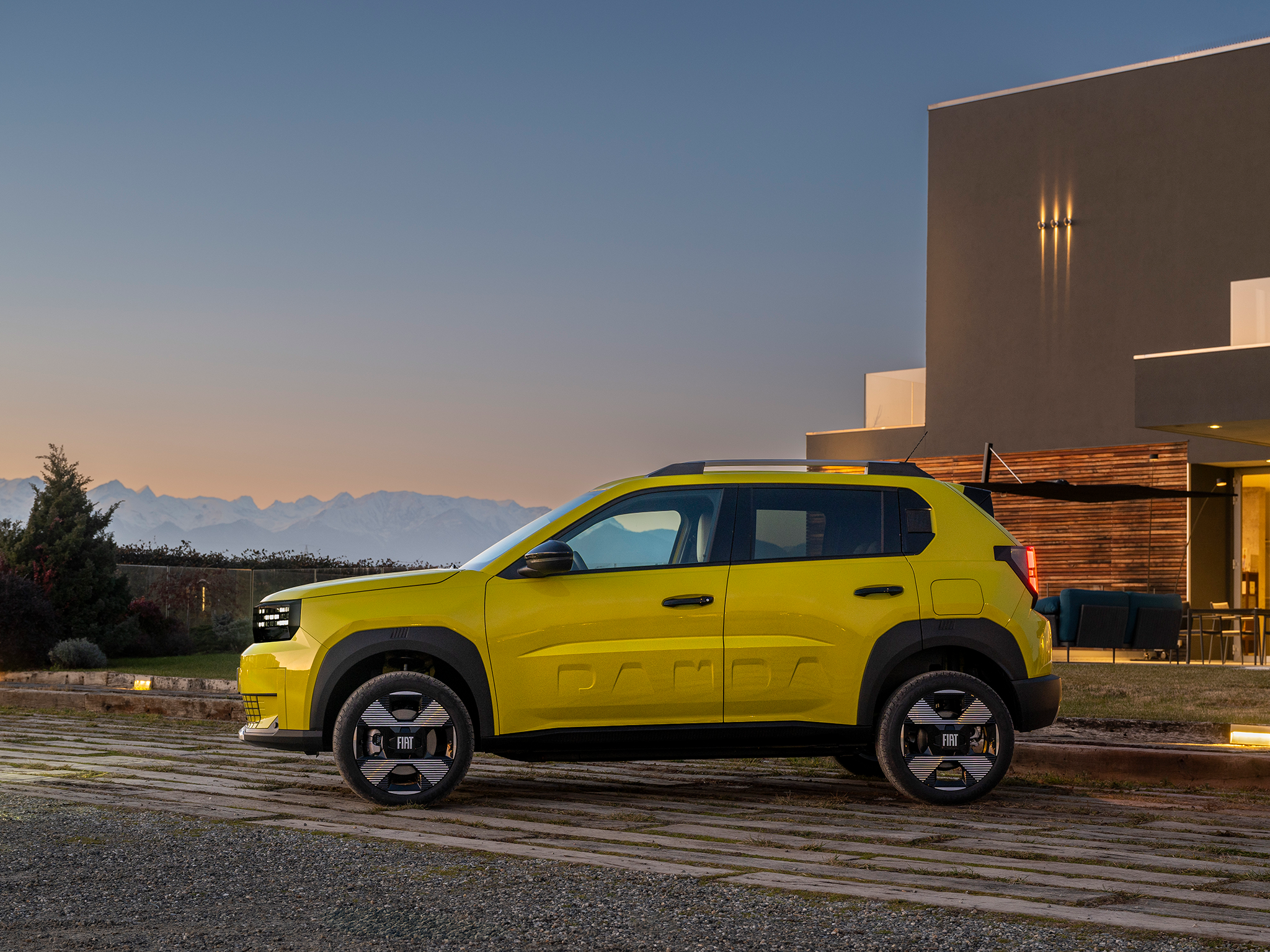 Panda-inspired detailing adorns the wheel arches, panels and rear doors of the Fiat Grande Panda