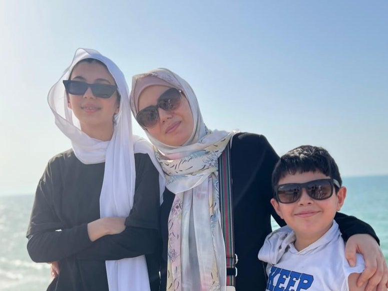 Amani, her daughter, Nada, and her son, Ayham, on a beach in Gaza