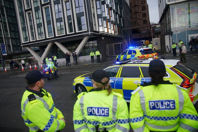 Police outside a court (Peter Byrne/PA)