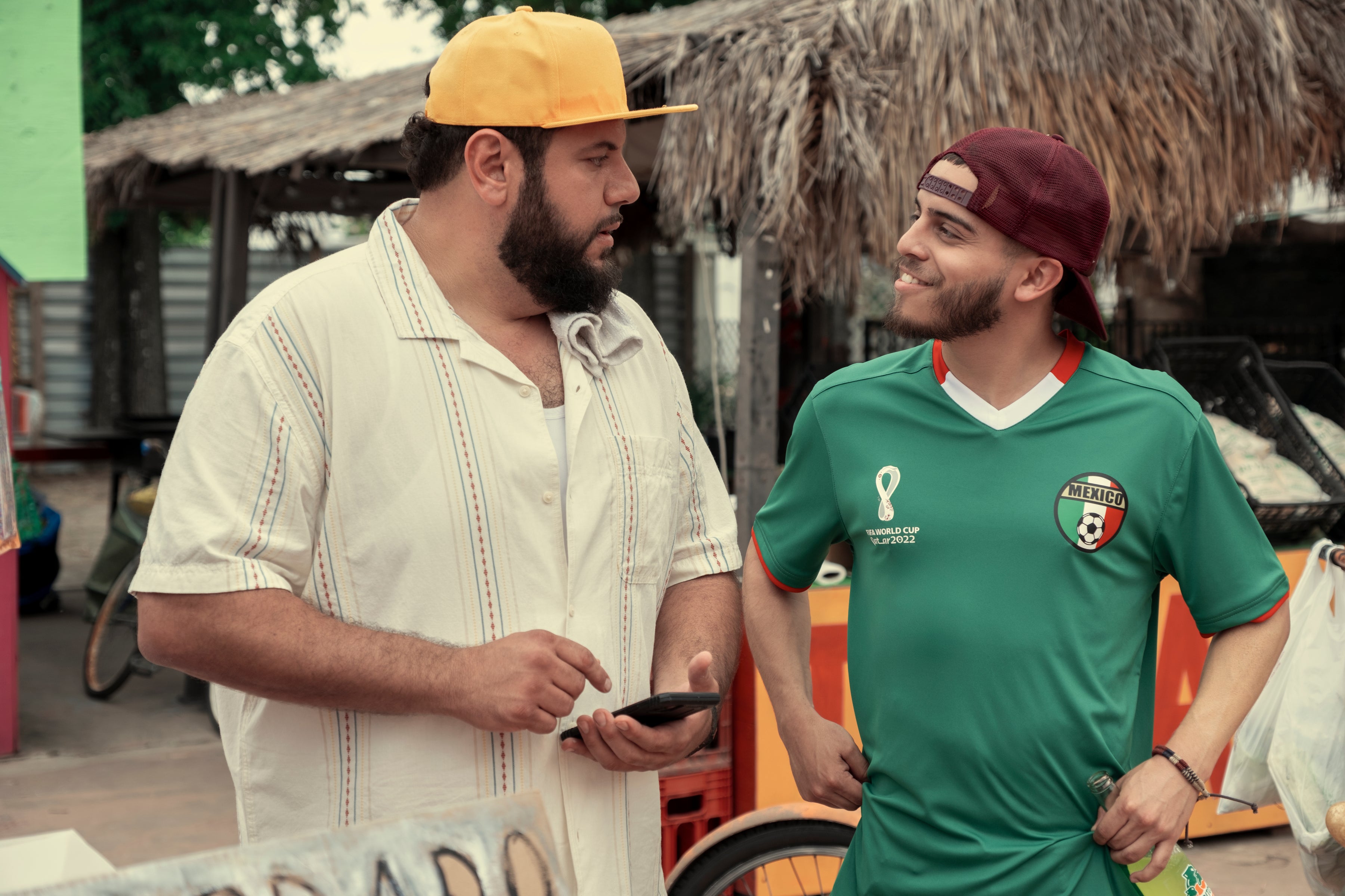 <p>Mo Amer as Mo (left) and Ralph Barbosa as Fernando</p>