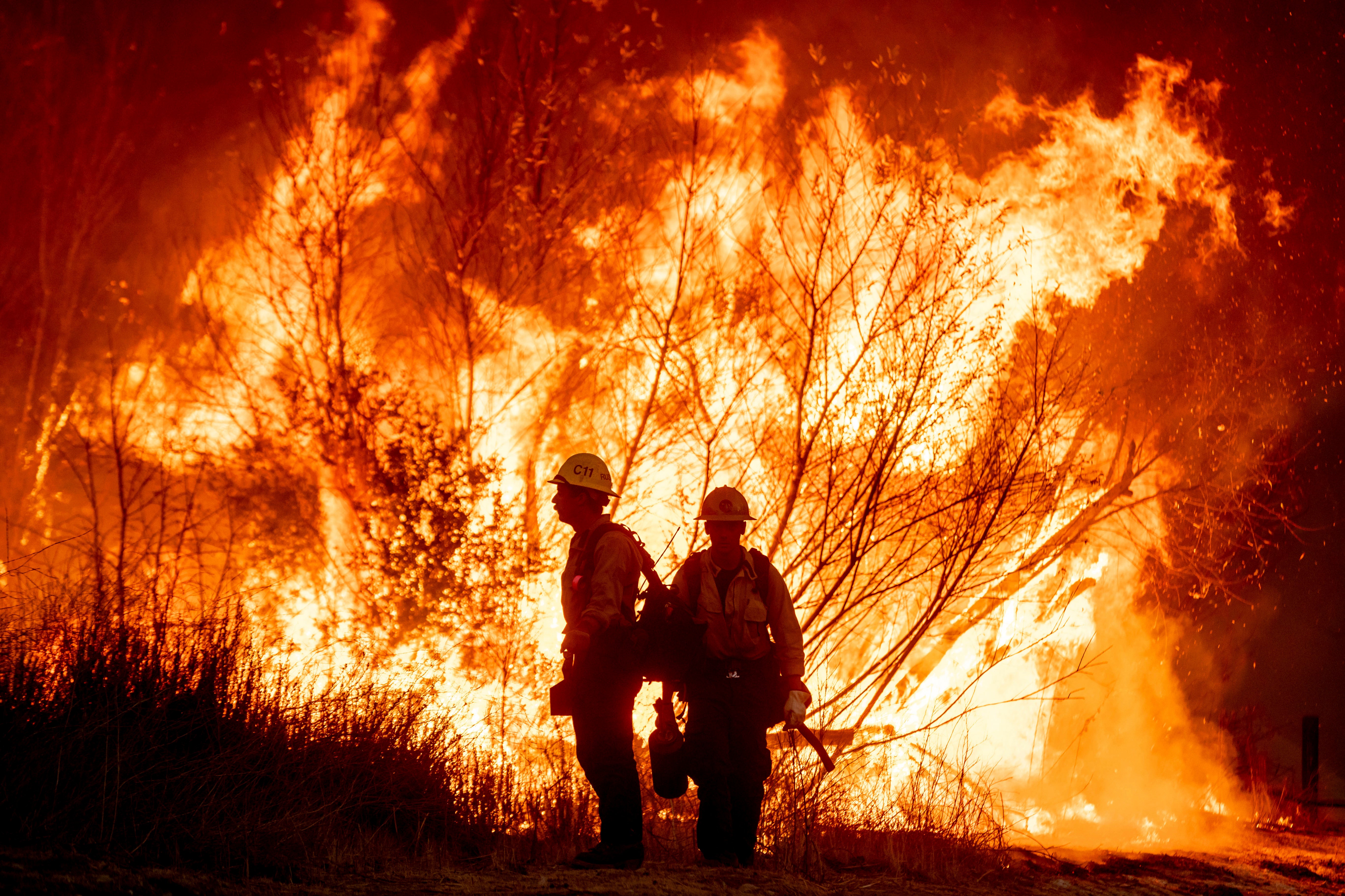 Firefighters battle the Kenneth fire in the West Hills section of Los Angeles earlier this month. The state’s deadly wildfires were made worse due to impacts from climate change, scientists said Tuesday