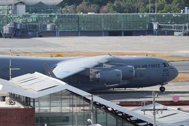 <p>A US military plane carrying Guatemalan migrants deported from the United States sits on the tarmac at La Aurora airport in Guatemala City</p>