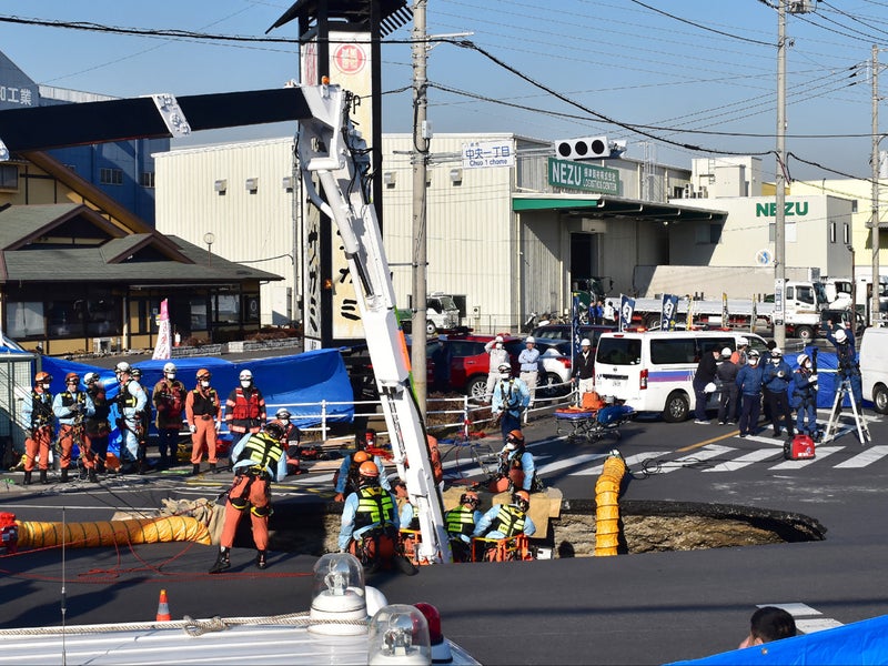 Truck driver disappears into swimming pool-sized sinkhole in middle of road