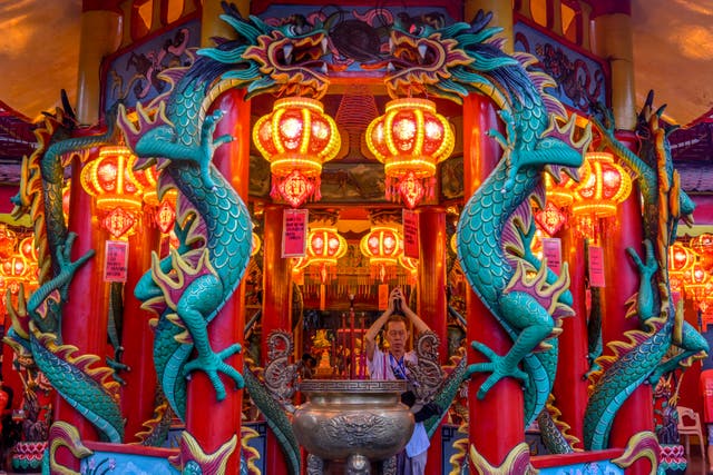 <p>A man offers prayers on the eve of the Lunar New Year of the Snake in Jakarta</p>