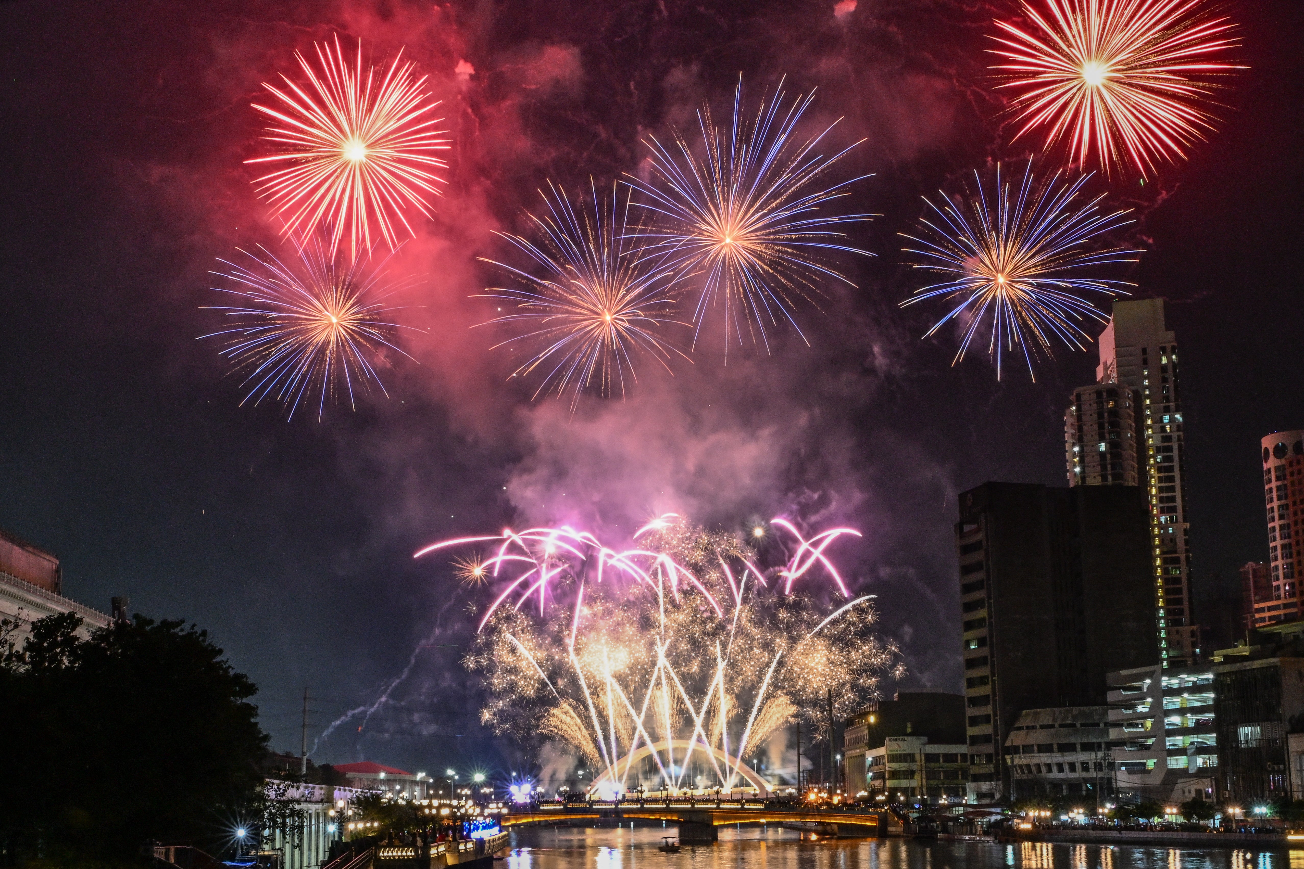 Fireworks light up the sky during the celebrations in Manila