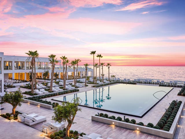<p>Sunsets on the Greek island of Crete can be best enjoyed by sipping a cocktail looking over the water’s edge</p>