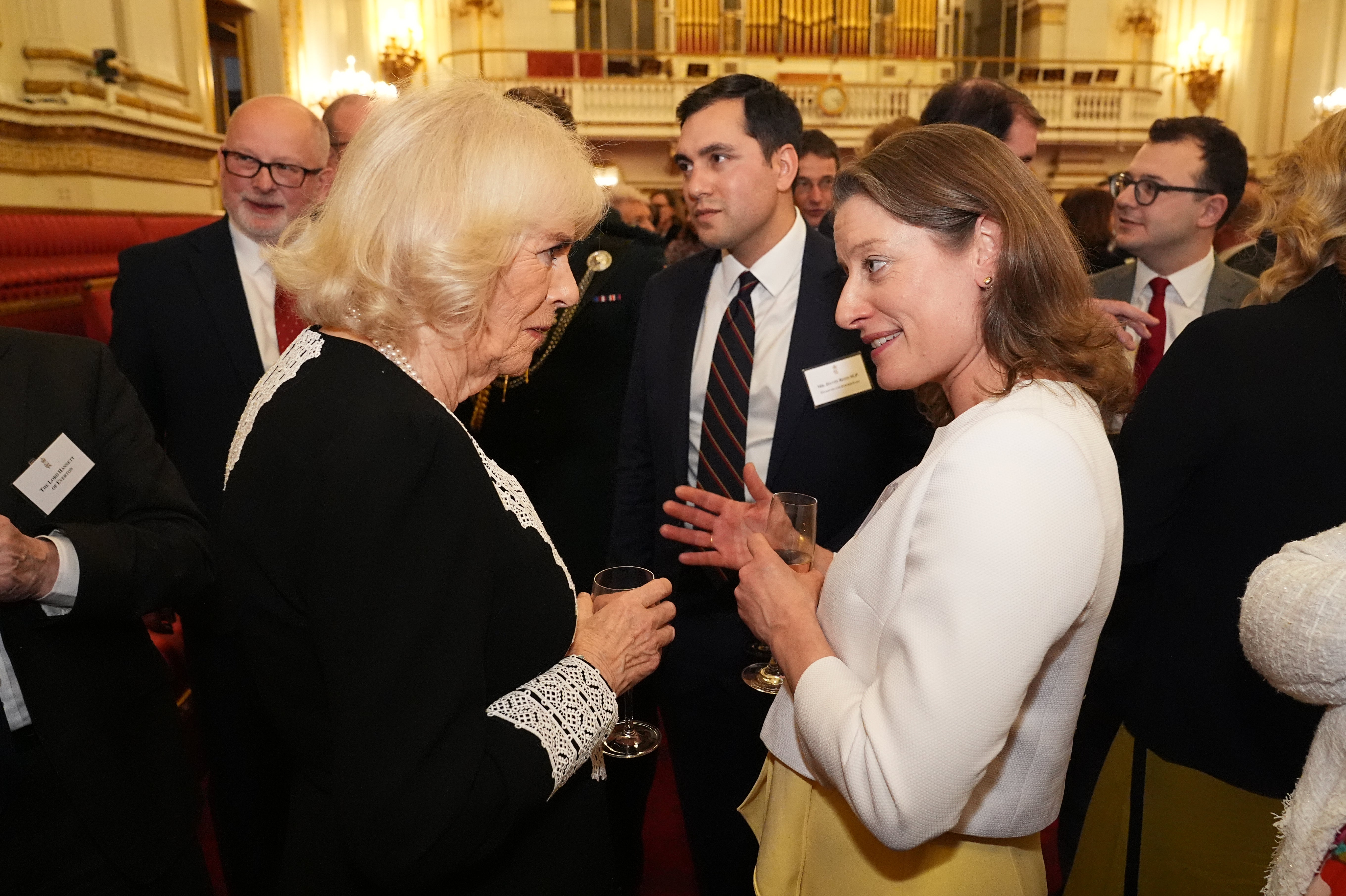 Liberal Democrat MP Helen Maguire, who served in Iraq and is pictured speaking with Queen Camilla, said JD Vance had ‘erased from history the hundreds of troops who gave their lives’