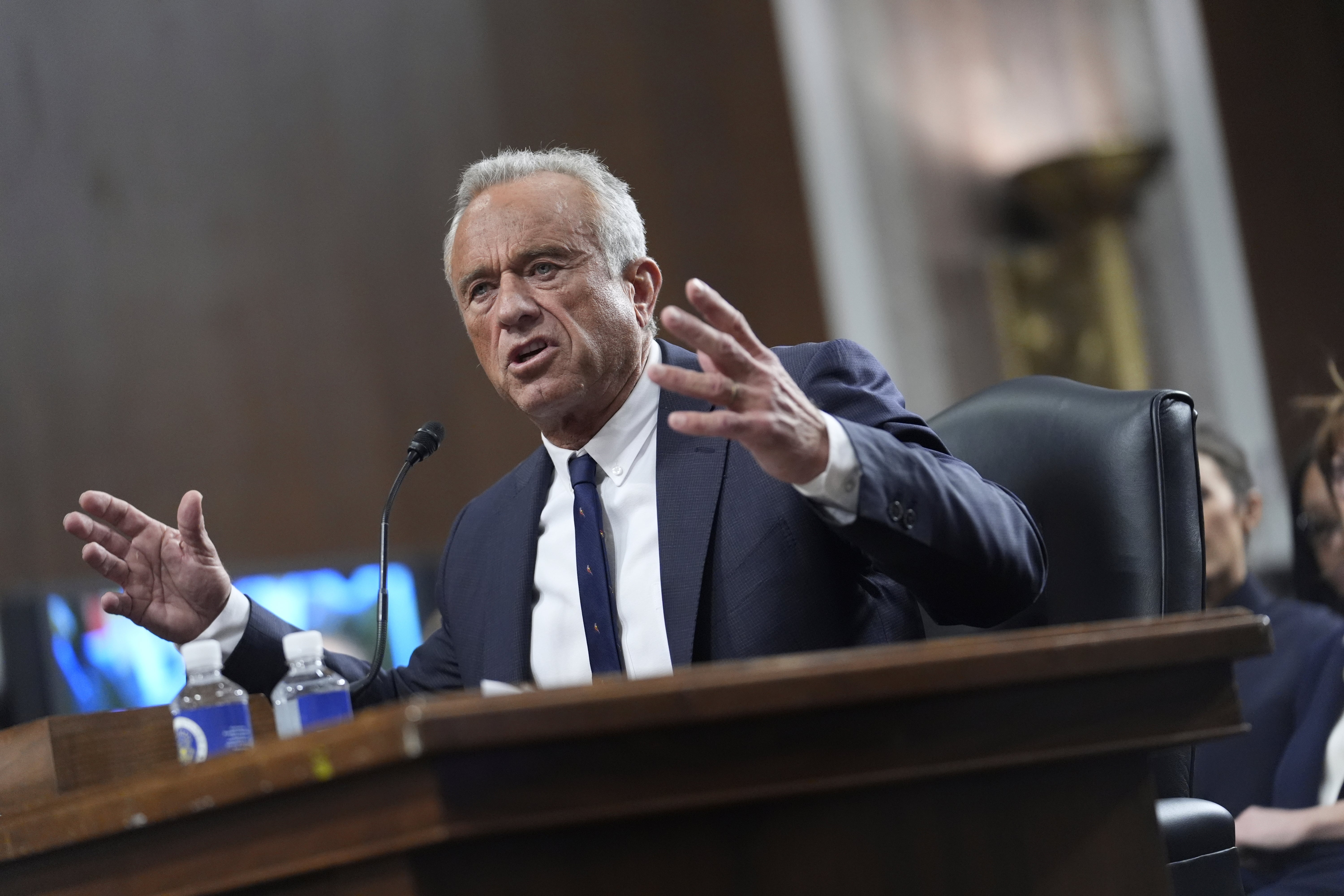 Robert F. Kennedy Jr., President Donald Trump's choice to be Secretary of Health and Human Services, appears before the Senate Finance Committee for his confirmation hearing at the Capitol in Washington, Wednesday, Jan. 29, 2025. he got into a heated argument with Sen. Elizabeth Warren