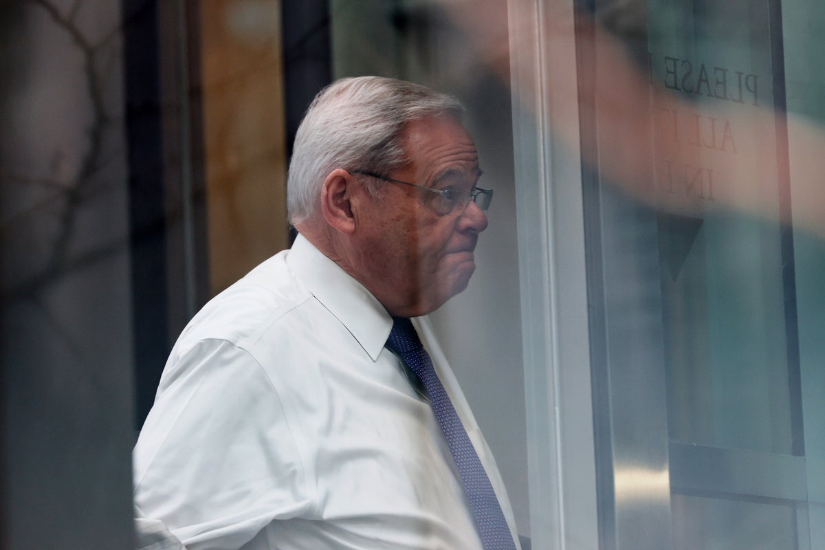 Disgraced former US Senator Bob Menendez weeps as he's sentenced to 11 years in prison in corruption case