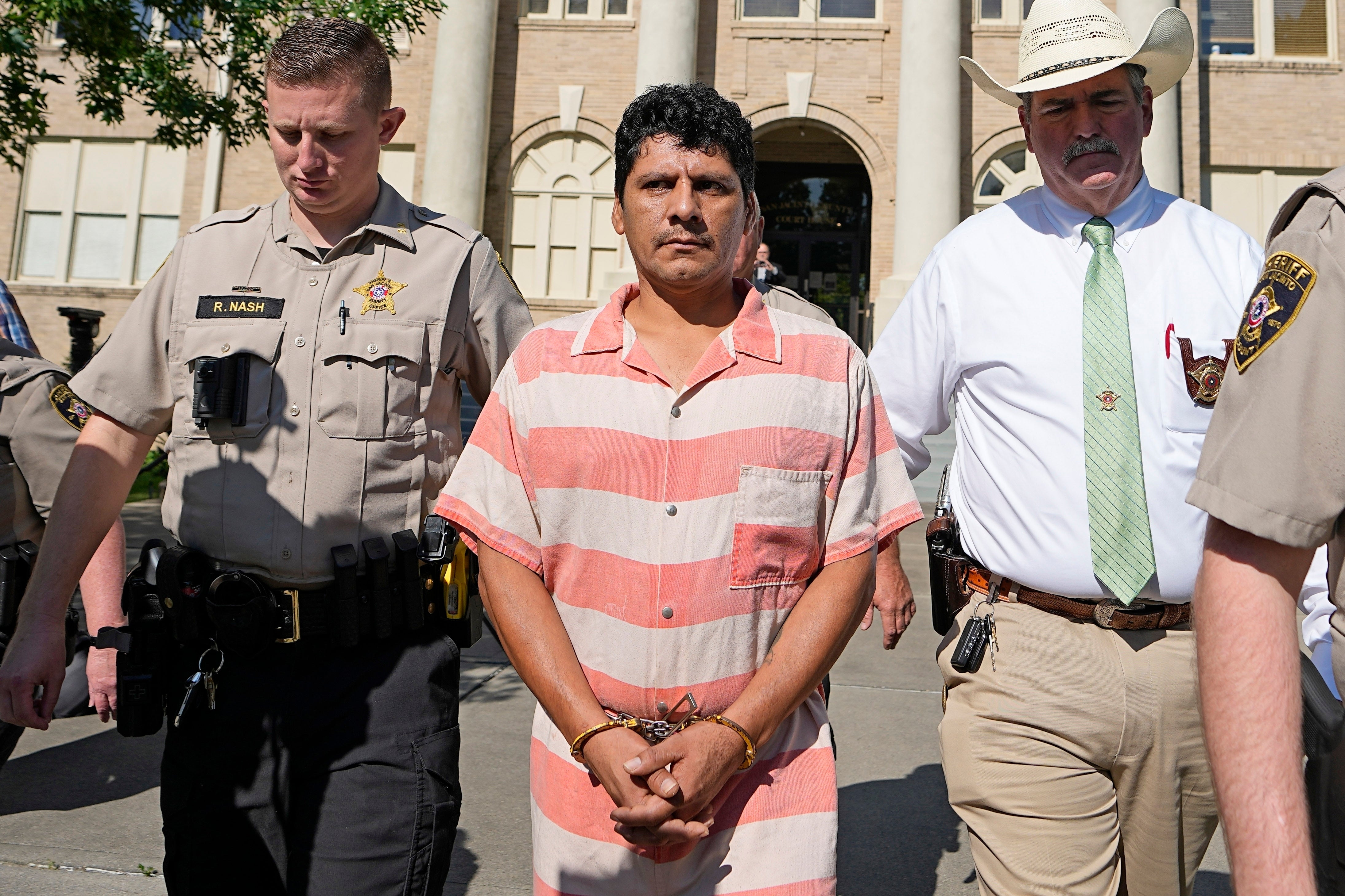 Francisco Oropeza is escorted from the San Jacinto County courthouse after a hearing in May 2023