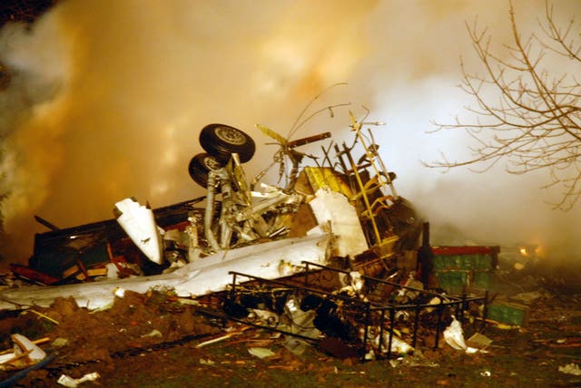 <p>In this 12 February, 2009 file photo, the wreckage of Continental flight 3407 lies amid smoke at the scene after crashing into a suburban Buffalo home and erupting into flames</p>