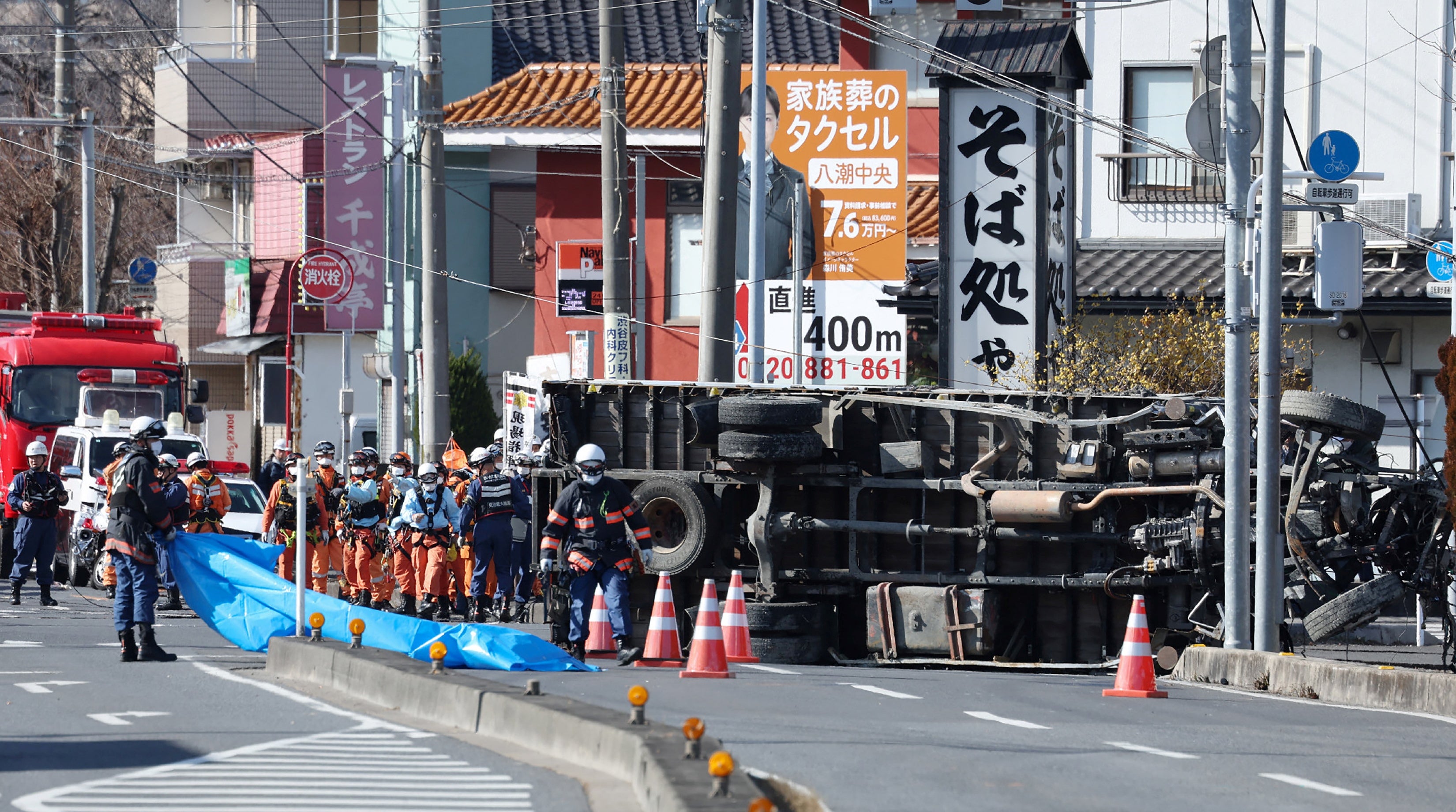 Rescue enactment    continues to prevention  a operator  aft  his motortruck  was swallowed by a sinkhole successful  the metropolis  of Yashio connected  29 January 2025