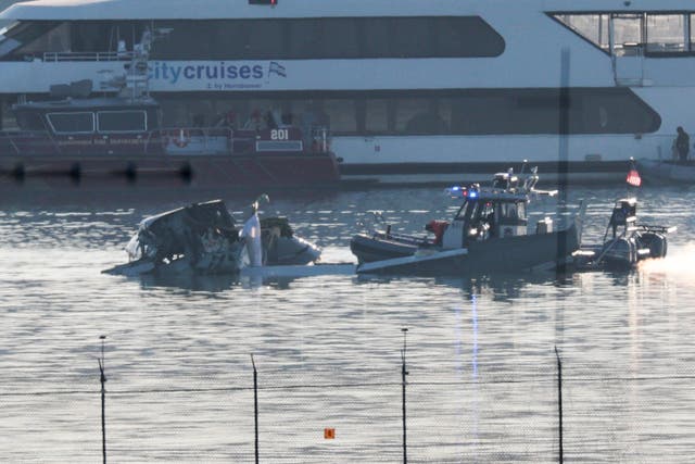 <p>Emergency crews search the Potomac River after an American Airlines jet and Army helicopter collided and crashed into the water</p>