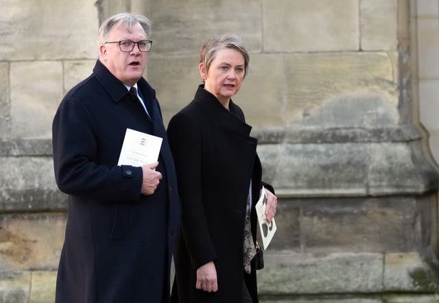 <p>Home secretary Yvette Cooper leaves Hull Minster with husband Ed Balls</p>