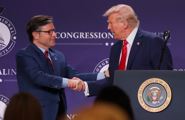 <p>U.S. President Donald Trump shakes hands with House Speaker Mike Johnson (R-LA) after addressing the 2025 Republican Issues Conference at the Trump National Doral Miami on January 27, 2025 in Doral, Florida</p>