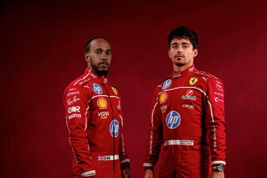 Lewis Hamilton and Charles Leclerc in their 2025 Ferrari race suits