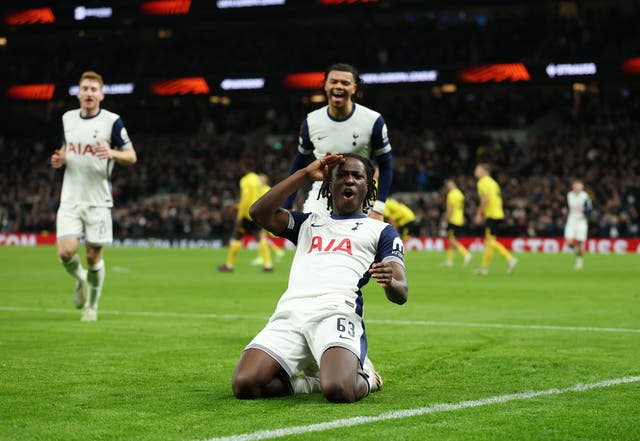 <p>Ajayi salutes the crowd after his first Spurs goal</p>