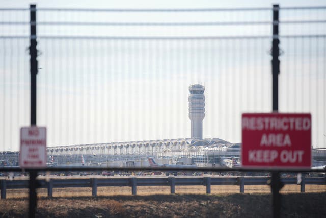 <p>A view of Ronald Reagan Washington National Airport. Air traffic control staffing at the airport was ‘not normal’ when a Black Hawk helicopter and American Airlines jet collided mid-air on Wednesday</p>