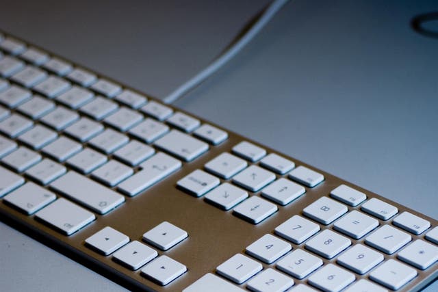A computer mouse and keyboard (Adam Peck/PA)